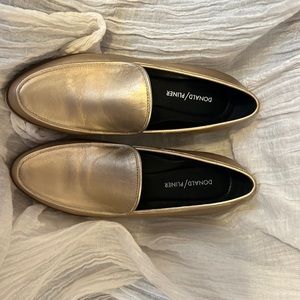 Gold women’s loafers